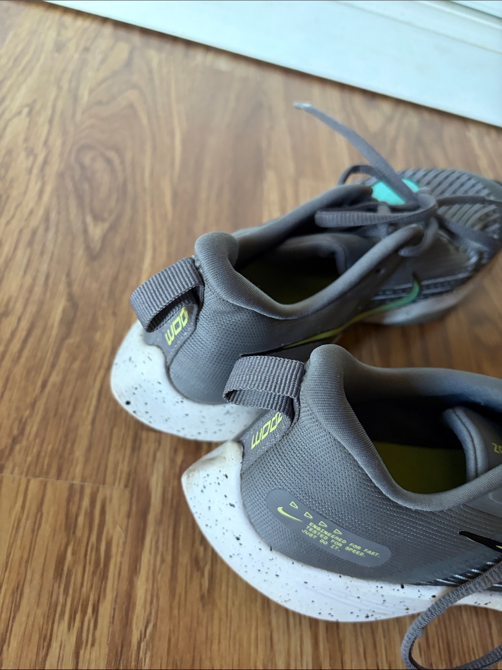 61/2 big kids or 8 women’s. Nike Kids Gray Sneakers with Teal Swoosh - Picture 7 of 7